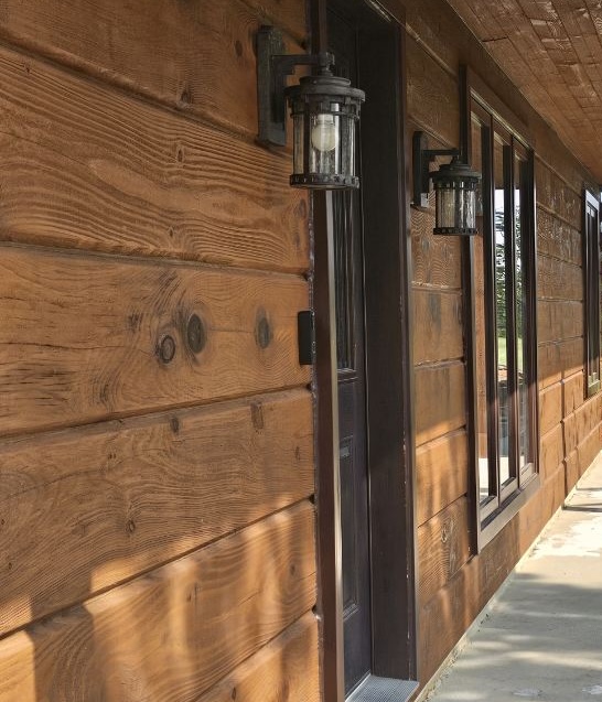 stained log home